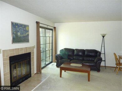 View of Living room showing Fireplace.