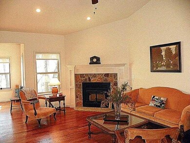 Living Room. Amazing custom stained wood floors and tremendous multiple ceiling heights.