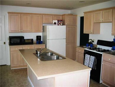 Kitchen. The oversize kitchen offers ample cabinet
