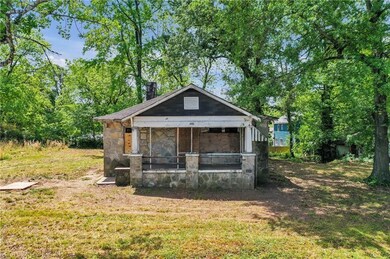 View of outbuilding with a yard