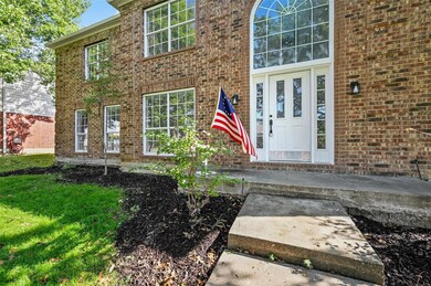 View of front of house with a front yard
