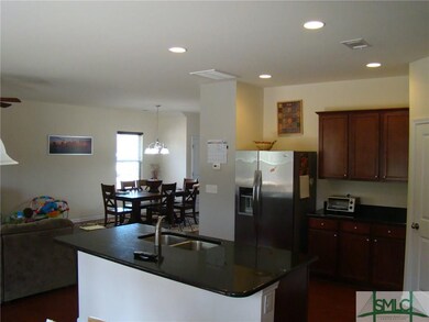 view of dining area from the kitchen