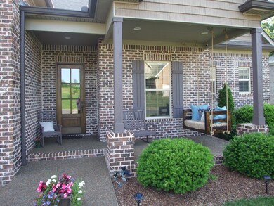 Front Porch equipped with Swing