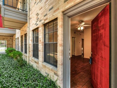 View of exterior entry featuring covered porch an