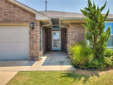 Front storm door & a covered front porch with gutt