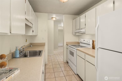 2501 Canterbury Ln E unit 106, Seattle, WA 98112 - photo 7