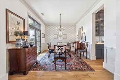 Tasteful dining room located directly off the entr