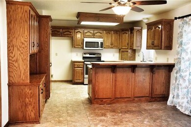 Lots of kitchen cabinets. Built in desk and pantry