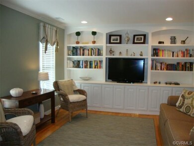 Gracious Living Room with built in bookcases, rece