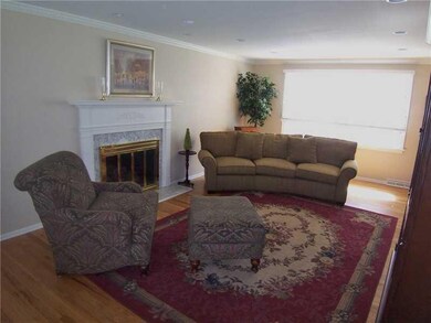 Living Room. Bright formal oasis offers neutral wa