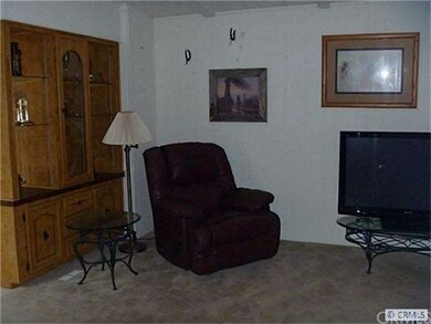 Other side of Living Room is separated from foyer 