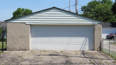 Oversized 2 car garage with opener
