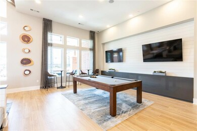 Rec room featuring pool table and light hardwood /