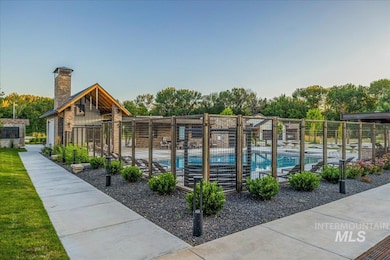 View of home's community featuring a pool