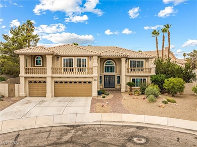 Mediterranean / spanish-style house featuring stucco siding, a tile roof, driveway, a garage, and a balcony
