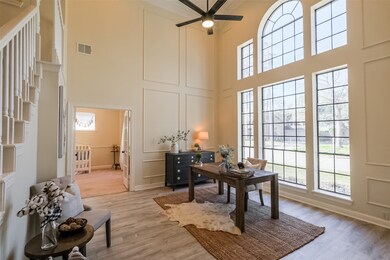 Sitting Room / Study as you walk in adjourned by the grand entry