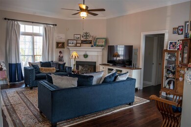 Spacious great room with gas fireplace and vaulted