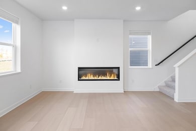 (Photo of a very similar home, actual finishes may vary)