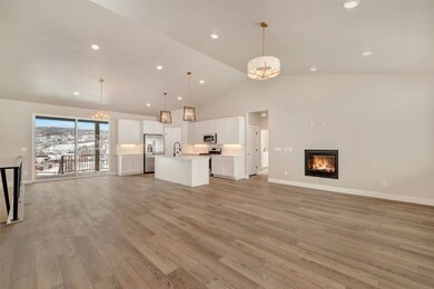 Large main living area with vaulted ceilings.
