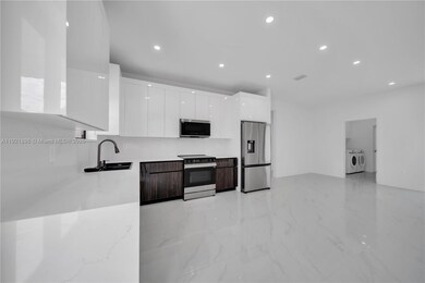 704 Holmes Ave, Lehigh Acres, FL 33974 - photo 3