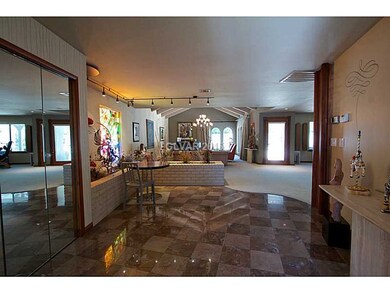 Property Photo. Entry hall with marble flooring an