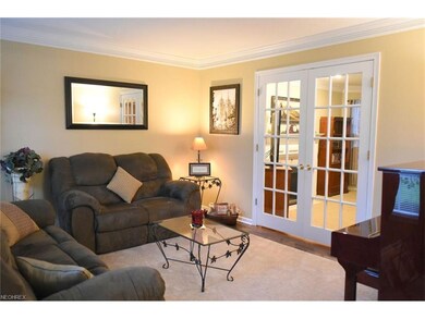 A bright, sunlit formal living room is offered