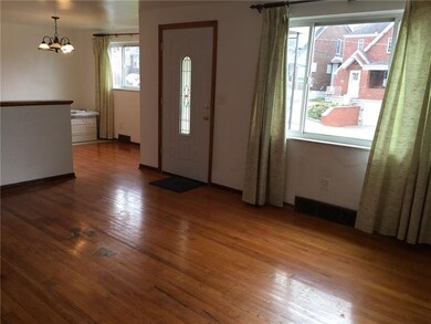 Spacious living room with plenty of natural light!
