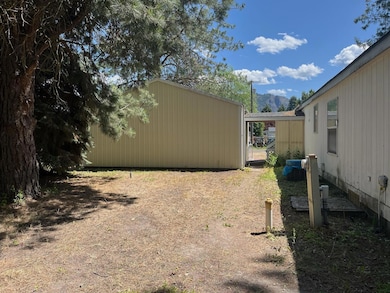 Side of home & Garage