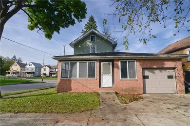 Enclosed porch & attached one car garage