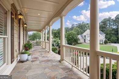 The porch wraps around the right side of the house.  Great for sitting, watching neighbors and cars go by. Plenty of great days and nights enjoying the weather