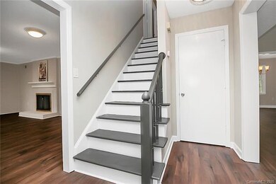 Freshly painted stairs, new vinyl plank floors thr