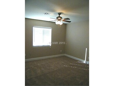Bedroom. Bedroom 2 with ceiling fan, new carpet an