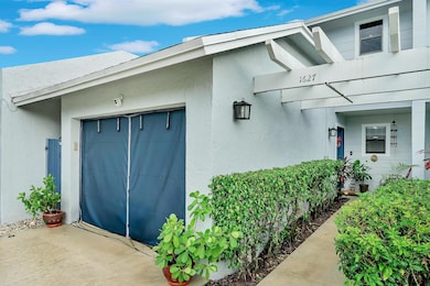 1627 Woodbridge Lakes Cir, West Palm Beach, FL 33406 - photo 2