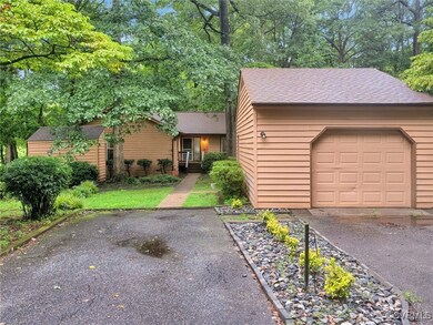 Ranch-style home featuring a garage