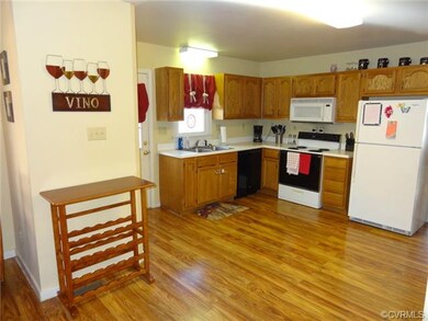 Kitchen contains lots of natural light and an eat-