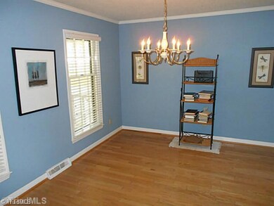 Dining Room. Dining room has doorway that leads to kitchen, making dinners easy!