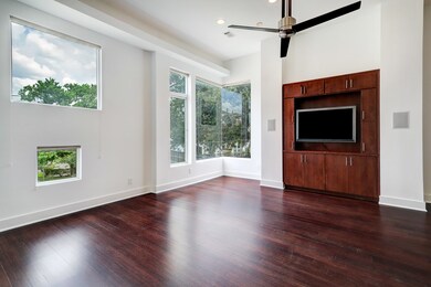 High ceilings and large picture windows in 2nd flo