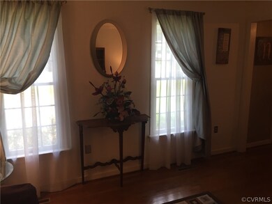 Formal Living Room, Wood Flors & Double Windows