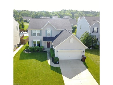 This home is surrounded by well kept homes, on a q