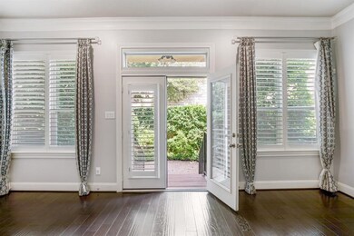 Double door in the living room leading to the back