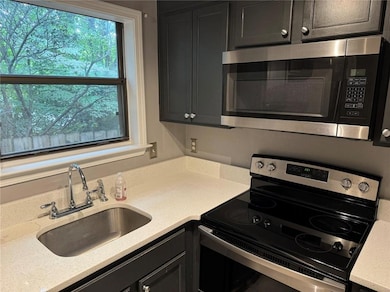 Kitchen featuring sink and stainless steel applian