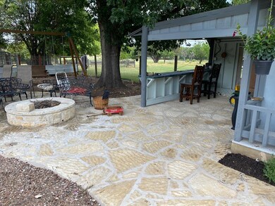Back yard bar and fire pit area
