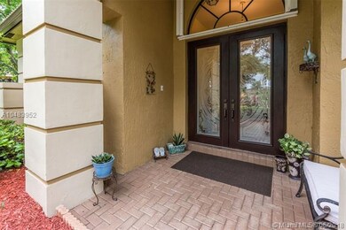 Spacious outside covered entrance with custom etch