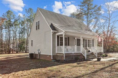 View of front of house featuring covered porch and