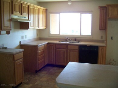 Kitchen with brkfast bar & newer cabinet