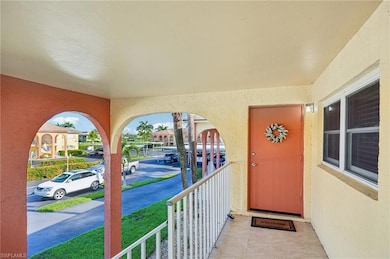 Property entrance with stucco siding