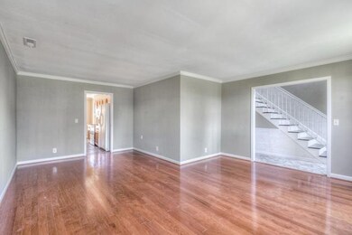 This Large Front Room could be used as a Formal Dining Room or a Den!