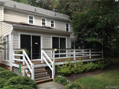 Rear deck wraps the back of the home and provides 