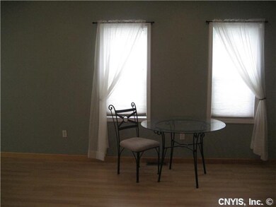 Dining Room. Dining area in front of windows optio