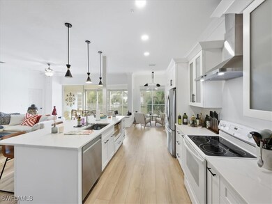Bright and airy kitchen featuring updated appliances and a functional layout.